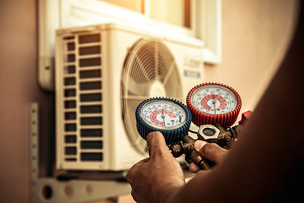 Professional Air Conditioning Service technician working in Garrison, TX